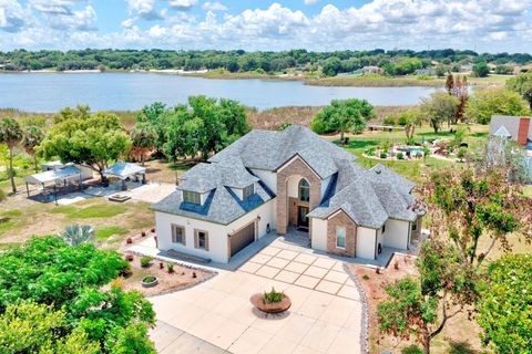 Photo of 91 Woodland Drive, Haines City, FL 33844 (MLS # L4961579)