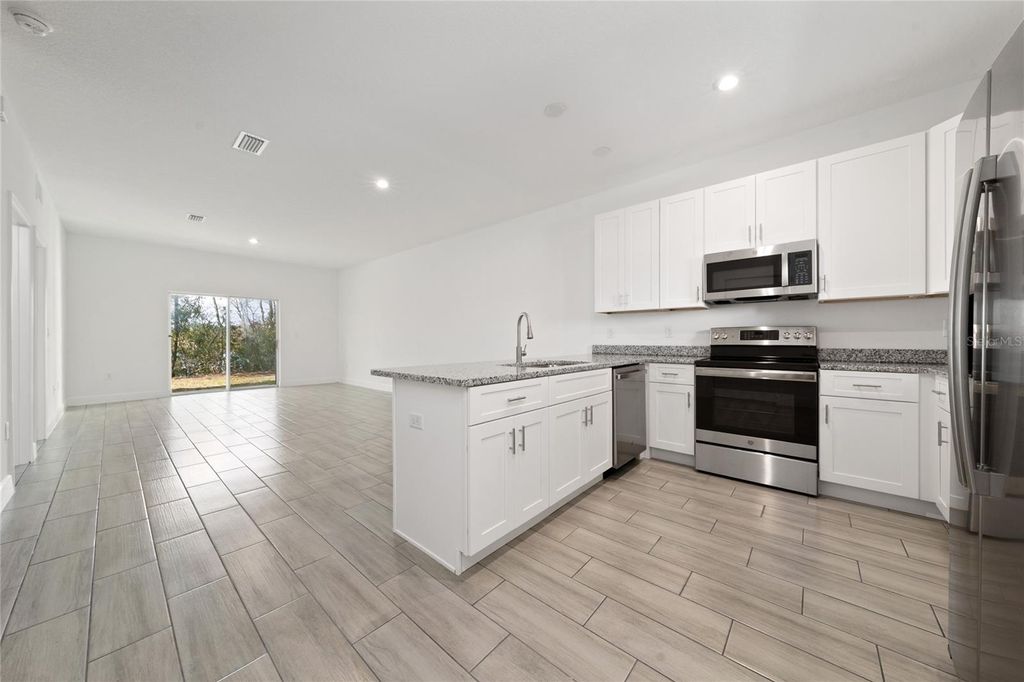 Photo of 460 Lake Shore Parkway, Davenport, FL 33896 (MLS # O6383807)