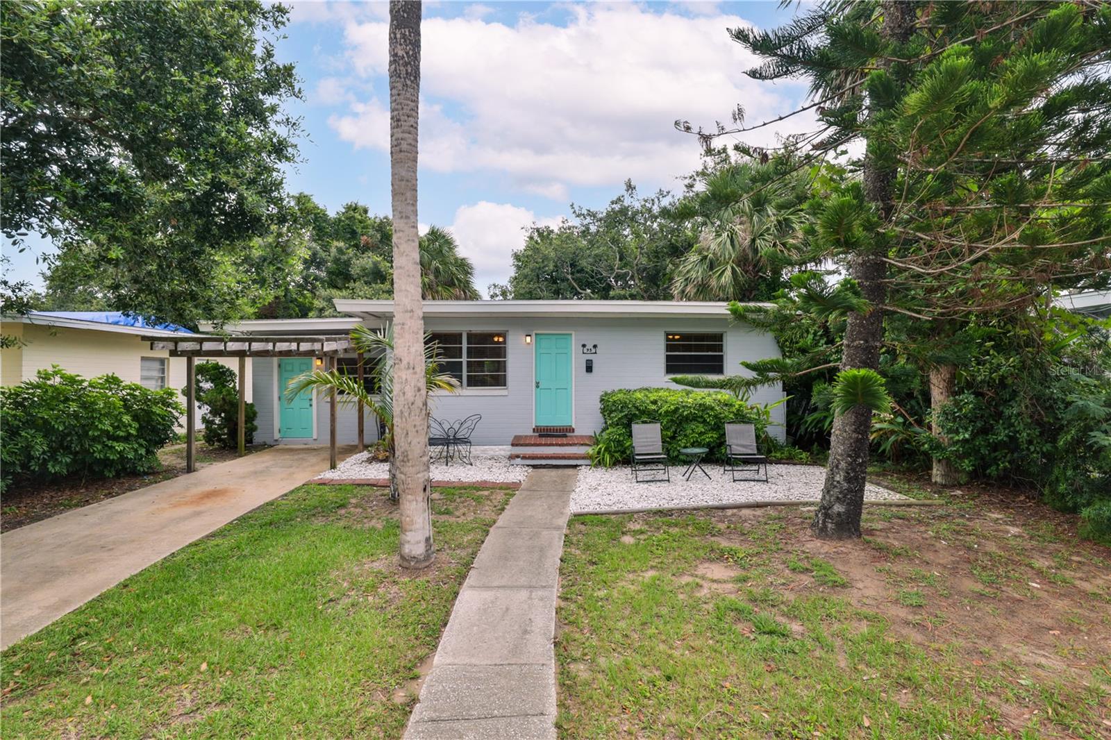 Under contract-accepting backup offers. Amazing location! This cute and cozy home sits only 2 blocks from the beach and Granada blvd, in the heart of Ormond beach-side. Walk to the beach, Rockefeller Gardens, Ormond Memorial Art Museum, or the many restaurants and businesses that surround this quiet street. This home features block construction, tile throughout except the bedrooms- which are original hard wood, an arched brick entryway from front room to the sunken living room, passthrough window/counter from kitchen to front room, inside laundry room with washer and dryer included, front pergola that could be used as a carport, back patio, and storage shed in the back yard. Roof is 2018. Hot Tub does not convey. Old generator hooked up to tank on the side of the house is non-functional, but could be replaced with a new one.
