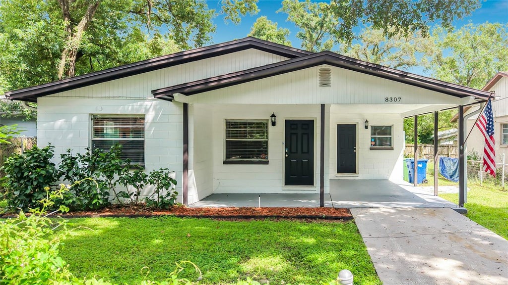 Photo of 8307 N Elmer Street, Tampa, FL 33604 (MLS # TB8548667)