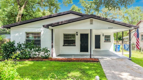 Photo of 8307 N Elmer Street, Tampa, FL 33604 (MLS # TB8548667)