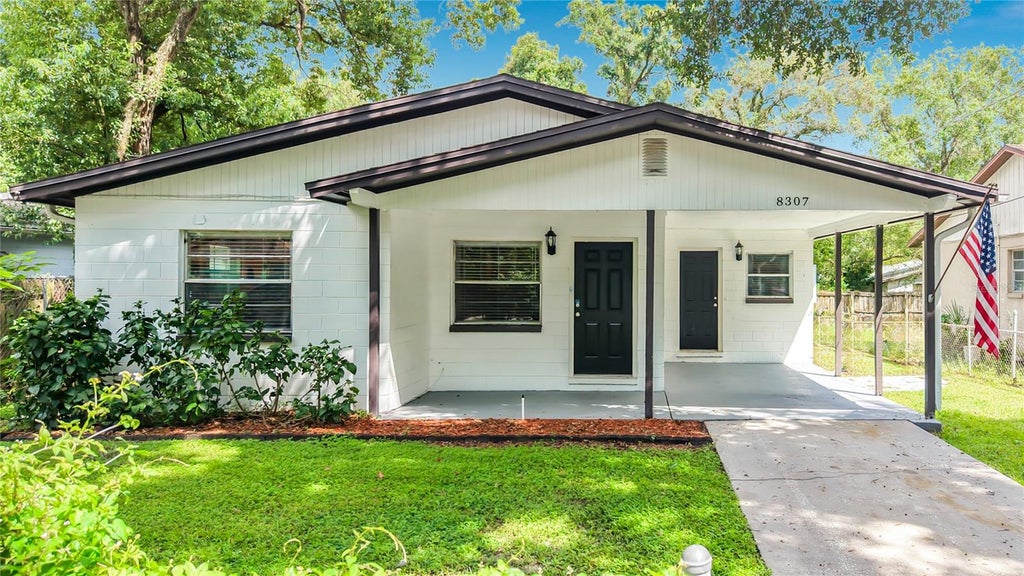 Photo of 8307 N Elmer Street, Tampa, FL 33604 (MLS # TB8548667)
