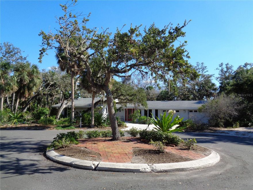 Pool Home!! Nestled on the peaceful tranquil island of Siesta Key, renowned for its world-class beach and romantic sunsets. JUST MINUTES FROM Siesta Beach & Village. This is the most wonderful place to embrace island-style living. This 3 Bedroom and 2 & 1/2 Bathroom home is ready for your personal touches. Enjoy relaxing in your Caged Pool & Patio area. This Single family home has approximately 1834 sq.ft +/- under air and a 2 car garage. The existing home—professionally remediated after flood damage—presents a unique opportunity for those looking to reimagine or completely rebuild. Almost 13,000 sq.ft lot with luscious natural landscaping and mature oaks. Updated roof around 2019.