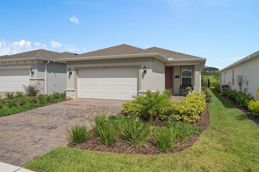 DON'T WAIT TO BUILD! See ALL the EXTRA'S ALREADY INCLUDED from the Builder and the SELLER in this Beautiful Home. Welcome to this Stunning CONTOUR Model with STONE ACCENTS located in Del Webb Minneola, a 55+ Guard Gated Community. Del Webb Minneola is located at one of the highest elevations in Florida and the views are Gorgeous. This home is well appointed with beautiful finishes. You can relax on the Extended Under Roof Screened Lanai and as an extra bonus, the Lanai is plumbed for an Outdoor Kitchen. The rear neighbors are a distance away leaving you an OPEN GREEN SPACE VIEW to enjoy. The REAR YARD is FENCED with Gates on each side of the home for Convenience. Upon entry, your eyes will be drawn to the Ceramic Tile that is laid Diagonally and the coordinating Luxury Vinyl that was selected for the Bedrooms and Office/Den/Study. The Kitchen offers Granite Countertops with a Undermount Single Stainless Sink for washing those large pots, Ceramic Tile Backsplash, SOLID WOOD CABINETRY, PANTRY with a CUSTOM SHELVING SYSTEM, Island with a Breakfast Bar and Pendant Lighting. A GE Stainless Steel Appliance Package and NEW Dishwasher complete the Kitchen. Adjacent to the Kitchen is the Cafe (Eating Area) with a Custom Light Fixture, and then onward to the Family Room / Gathering Area that is adorned with natural light, Ceiling Fan, Floor Electrical Outlet and a clear view to the EXTENDED COVERED Lanai with Pavers and two Ceiling Fans. Entering the Primary Bedroom Suite, you will be graced with a Generous size room, Ceiling Fan, Luxury Vinyl Plank Flooring and Natural light. The Primary Bedroom En-Suite offers a COMFORT HEIGHT Dual Sink Vanity with Quartz Counters, plenty of storage, a Large Walk-In Closet, Large Shower with a Built-In Seat, Separate Hand Held Sprayer, UPGRADED FLOOR and WALL TILE, Grab Bar is installed for your convenience and a Water Closet for your privacy. The Laundry Room is centrally located near the Primary Suite and has Upper Cabinetry for additional storage. BEDROOM 2 offers a nice sized CLOSET with CUSTOM SHELVING/HANGING and is adjacent to BATHROOM 2 that has been UPGRADED WITH A WALK-IN SHOWER, UPGRADED WALL and FLOOR TILE with a Grab Bar and a COMFORT HEIGHT Single Vanity with a Quartz Countertop. The GARAGE also has UPGRADES consisting of an Exterior Key Pad, EPOXY PAINTED FLOOR, Lighting Package, PULL DOWN ATTIC STAIRS with 2"x6" TRUSSES and 3/4" PLYWOOD FLOOR for your STORAGE NEEDS. A Security System & CAT6 Data Ports too. The ENERGY PACKAGE was also selected and includes FOAM FILLED BLOCK, FRESH AIR INTAKE, Additional Caulking and the MICROWAVE is VENTED OUTSIDE. 2" Faux Wood Blinds and Vertical Blinds are on the operable windows and Sliding Glass Door respectively. The Seller's Additional UPGRADES AFTER PURCHASE Include the following: 6 Remote Ceiling Fans with Lights, Screened Lanai with a Custom Hose Bib Attachment, Fenced Rear Yard with 2 Gates, Pantry, Bedroom 2 Walk-in Closet and the Front Entry Closet have a Custom Shelving/Organizing System, Interior Light Fixtures and Gutters. Close to HOSPITALS, VA, Medical Offices, National Training Center, SHOPPING & DINING, Miles of Biking/Walking Trails and a 20 minute drive to either Downtown Clermont or Winter Garden for more enjoyment. For your Traveling convenience, Del Webb Minneola is a few minutes to the Florida Turnpike. HOA includes 1 gig Internet, 75 TV Channels, Amenities (OPENING SOON), Lawn/Shrub Care, Fertilizing. Take a look at this GREAT HOME.
