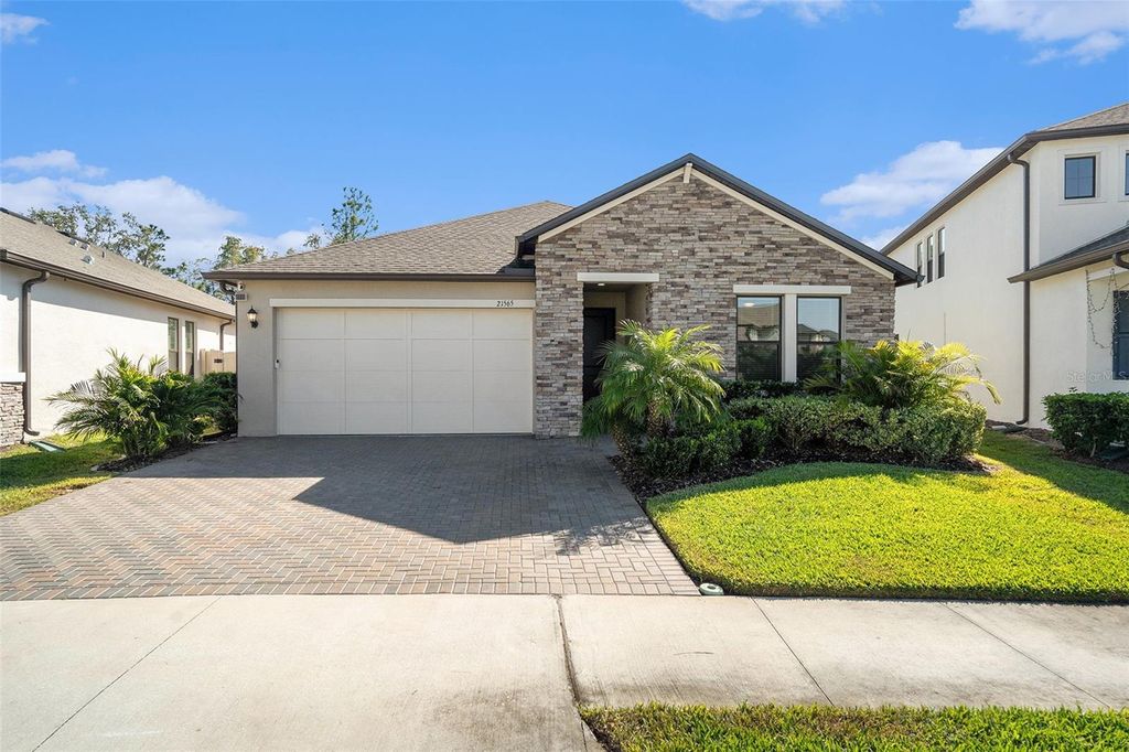 Photo of 21565 Violet Periwinkle Drive, Land O Lakes, FL 34637 (MLS # W7880532)