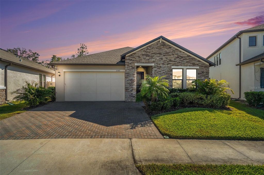 Photo of 21565 Violet Periwinkle Drive, Land O Lakes, FL 34637 (MLS # W7880532)