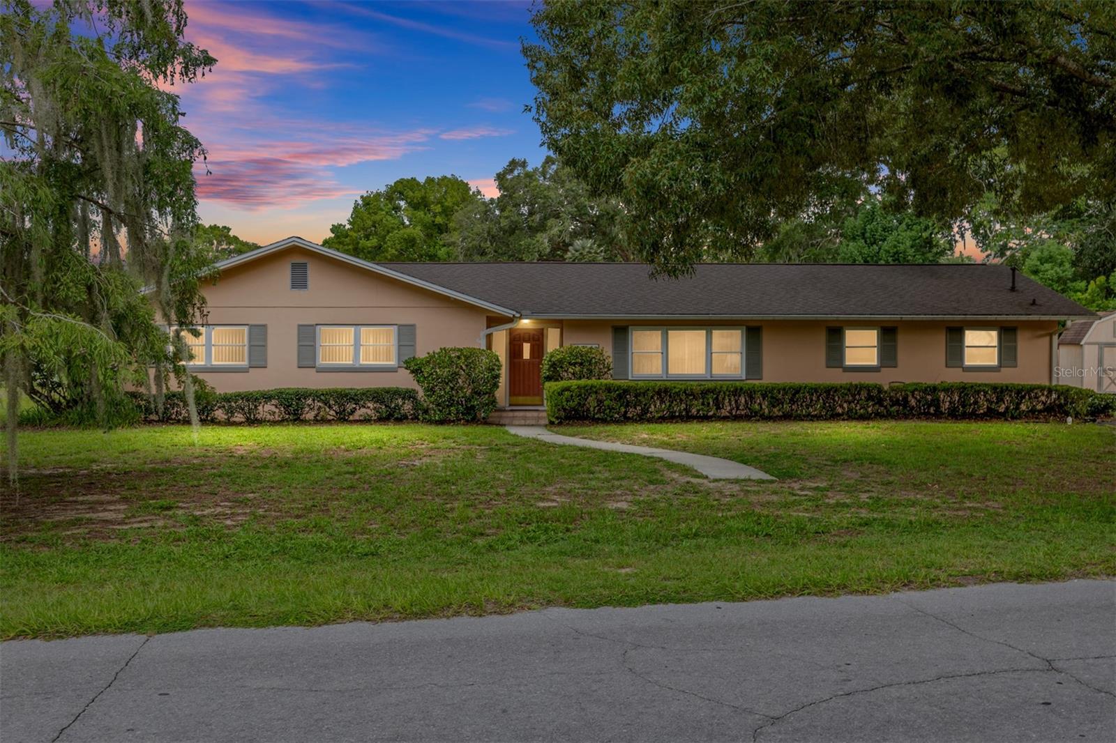 Spacious, and lovingly cared for home, both inside and out! This charming, 3 bed, 2 bath home on just under a half an acre is ready for you to make your own! Move-in-ready, or ready for your tasteful updates! Large kitchen with tons of cabinet space is sure to impress. A living and a family room are harder to find in newer homes, but both are here for you! Plenty of driveway and parking leads to your side garage, and separate large storage shed. Roomy covered and tiled back porch, with french door access, highlights the private back yard. Finally, new roof in late 2021 gives you piece of mind on that big-ticket item for many years to come. Come see it and make it yours today!