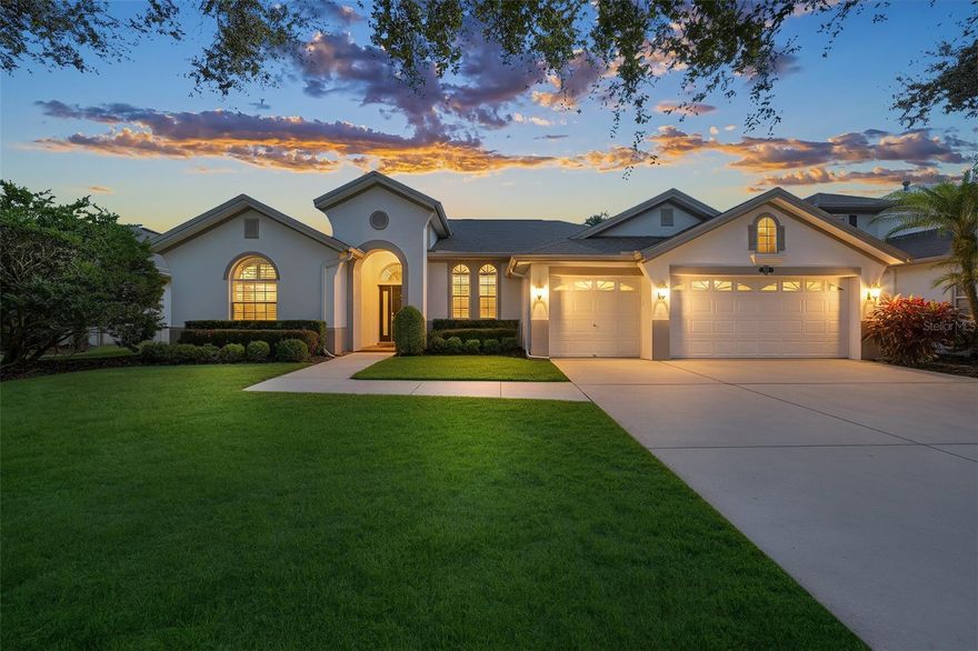 Some homes impress on paper. Others leave an impression the moment you turn onto the street.

Behind the gates of Deer Creek, one of Carrollwood’s most distinguished gated communities, this one-story residence unfolds within a setting defined by mature, tree-lined streets, privacy, and a quiet sense of refinement. It’s a neighborhood where arrival feels intentional and where everyday life slows just enough to be enjoyed.

Nestled on a .23-acre lot, the home offers 2,575 square feet of thoughtfully designed living space anchored by a rare three-car garage and a split-bedroom floor plan that balances openness with privacy. The architecture immediately signals purpose: formal living and dining rooms welcome guests with grace, while the heart of the home opens into an expansive family room designed for connection, comfort, and ease.

At the center, the chef's kitchen commands attention without demanding it. Features include elegant, 42-inch upgraded wood cabinetry, granite countertops, stainless steel appliances that convey, wall ovens, a gas range with a decorative stainless steel hood, and a walk-in pantry come together around a central island, creating a space that supports both casual mornings and memorable evenings. Overlooking the family room, the kitchen allows conversations to flow as naturally as the layout itself.

Throughout the home, architectural details elevate the experience. Wood flooring, plantation shutters, decorative columns, tray ceilings, and crown molding add warmth and dimension, while a cohesive neutral décor creates a timeless canvas ready to reflect any personal style.

The owner’s retreat is a sanctuary of its own. Generously sized, it includes a large sitting area that invites quiet moments at the start or end of the day. Two walk-in closets provide exceptional storage, while the spa-inspired bathroom offers a soaking tub, separate shower, dual vanities, and a private water closet, delivering comfort, privacy, and everyday indulgence.

Additional bedrooms are thoughtfully placed within the split plan, including a secondary bedroom with an en-suite half bath, ideal for guests or a private flex space. A well-equipped laundry room with additional cabinetry adds functionality, with washer and dryer included.

Outdoors, a screened patio with pavers extends the living space, offering a peaceful backdrop for morning coffee or evening gatherings. The setting feels private yet connected, echoing the balance Deer Creek is known for.

The roof was replaced in 2019 and New A/C coils & condenser replaced December 2025. Perfectly positioned near Lake Magdalene/Carrollwood's most popular amenities, including Whole Foods, Fresh Market, Starbucks, dining, and shopping, and offering easy access to major roadways, Tampa International Airport, USF, Moffitt, and downtown Tampa, this home delivers not just a place to live, but a lifestyle shaped by convenience, comfort, and understated luxury.

This is a home designed for the next chapter, where space, elegance, and location come together seamlessly, and where every detail supports a life well lived.