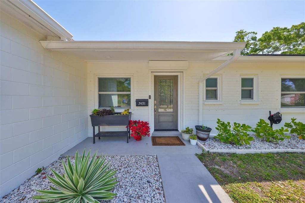 Photo of 7491 Cedar Street NE, St Petersburg, FL 33702 (MLS # TB8368424)