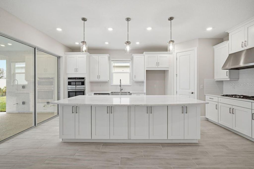 Photo of 3863 Figliolia Way, Wesley Chapel, FL 33543 (MLS # TB8451200)