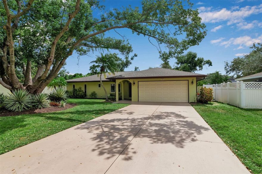 Experience Florida living in this updated Beechwood Estates home. Recent upgrades include a brand new roof and air conditioning system. This beautifully appointed 3 bedroom, 2 bath residence is ready for you to move in and enjoy. From the covered patio and saltwater heated pool to the chef-inspired, eat-in kitchen with its gas range and designer hood vent, this home is designed for comfort and entertaining. A 2015 / 2016 remodel added premium upgrades like Nevoa Cork flooring, Cambria Stone countertops, and impact windows. The recently painted primary suite provides a peaceful retreat. Guest bedrooms share a beautifully remodeled Jack & Jill bath with convenient pool access. A spacious interior laundry room can also do double duty as a hobby room with incredible storage. The oversized lot and mature landscaping offer privacy, while the spacious 2 car garage provides even more storage. The backyard is completely fenced. Located just minutes from downtown, St. Armands Circle, area beaches, 1-75 , and the UTC mall. This home is a must-see.