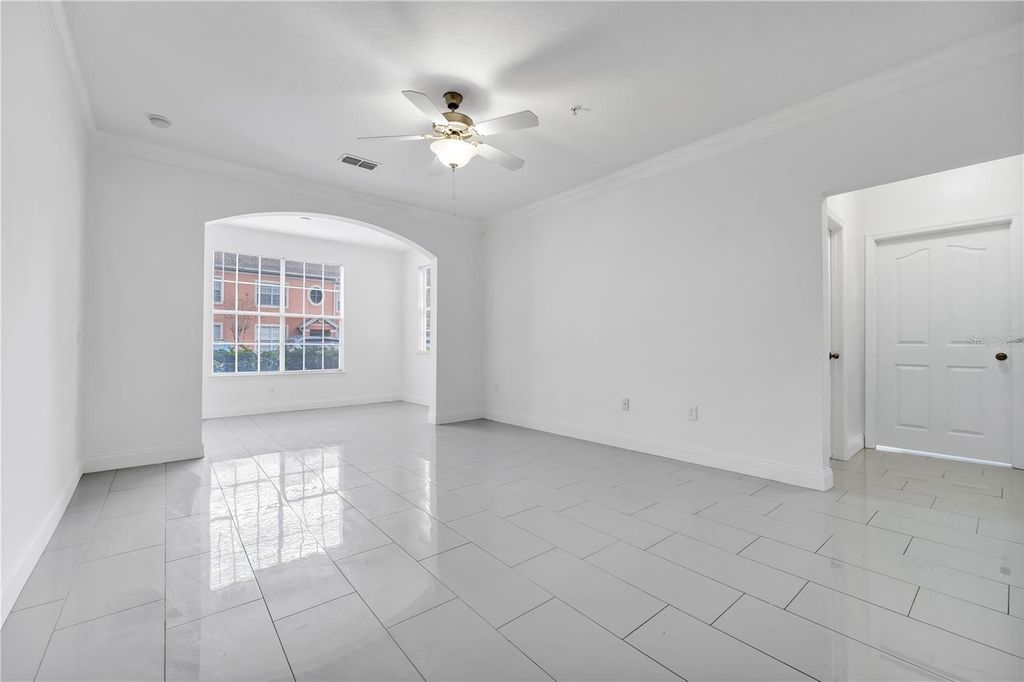 Photo of 12855 Madison Pointe Circle #101, Orlando, FL 32821 (MLS # O6393617)