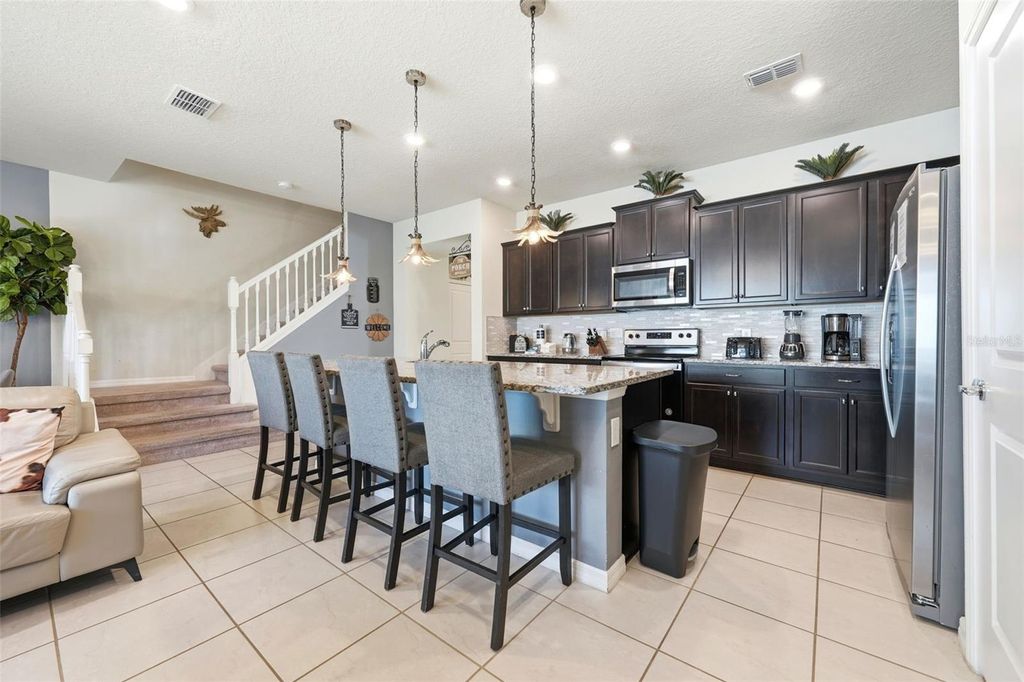 Photo of 626 Jasmine Ln, Davenport, FL 33897 (MLS # O6389172)