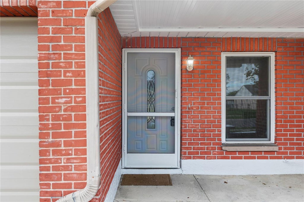 Photo of 8221 Autumn Oak Avenue, Port Richey, FL 34668 (MLS # TB8551872)
