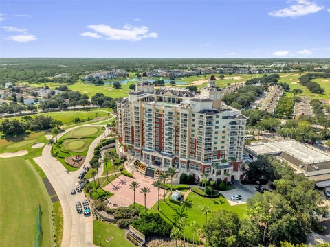Photo of 7593 Gathering Drive #803, Reunion, FL 34747 (MLS # O6445478)