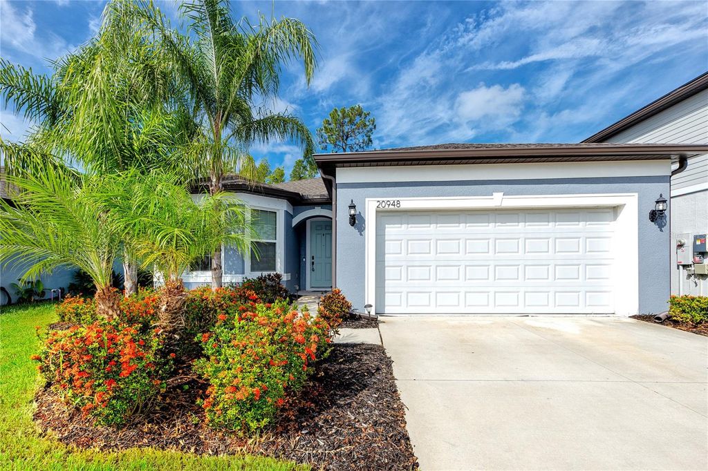 Photo of 20948 Monza Loop, Land O Lakes, FL 34638 (MLS # TB8417975)