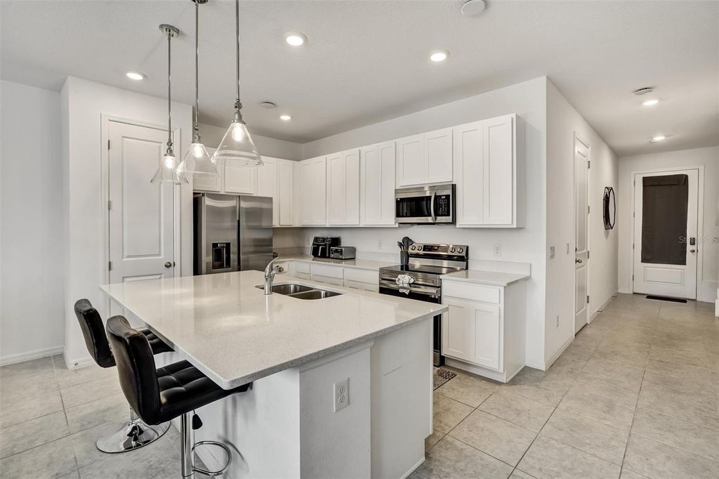 Photo of 1056 Plantation Lane, Davenport, FL 33896 (MLS # O6393421)