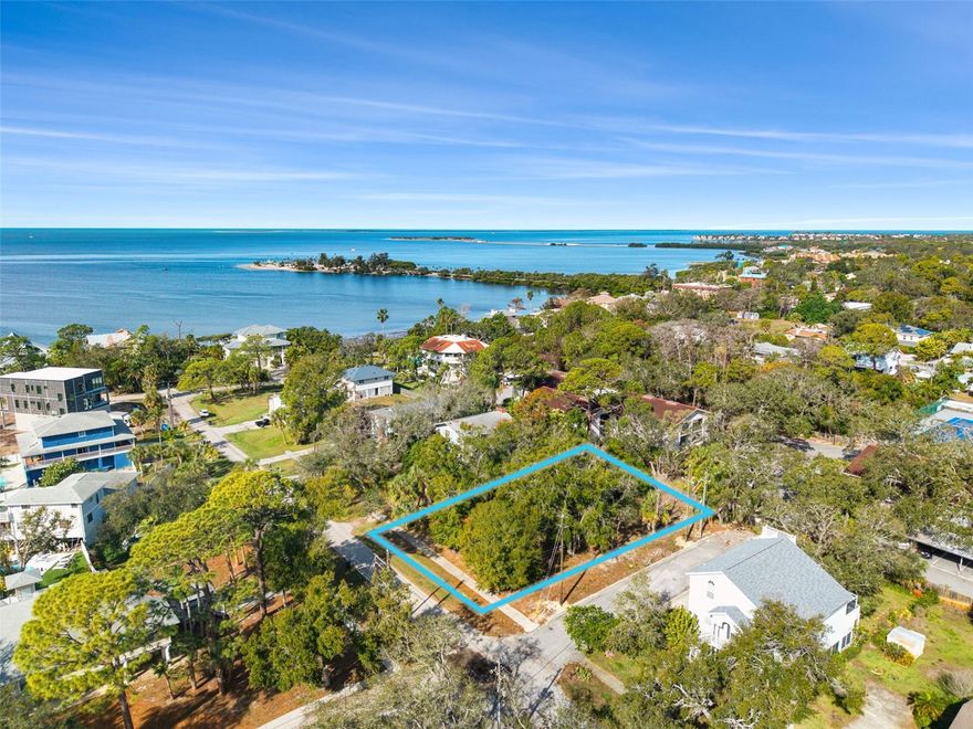 Rare opportunity in sought-after Tarpon Springs! This corner lot is perfectly positioned on a quiet dead-end street, offering privacy while being just walking distance to the Gulf of Mexico.
**Design without limits in one of Tarpon Springs’ most coveted coastal enclaves.** This expansive **.31-acre corner homesite (13,000+ sq ft)** sits on a **private dead-end street**, just **steps from the Gulf of Mexico**, offering the ideal canvas for a bespoke coastal estate.

Surrounded by **new luxury construction commanding up to $1.5M**, this property delivers the rare combination of **privacy, prestige, and proximity to the water**. With **no HOA**, you have the freedom to create a custom residence tailored to your vision—whether that includes a resort-style pool, expansive outdoor living, or a striking modern coastal design.

Offered at **$200,000**, this is an exceptional opportunity to secure a premium lot in a rapidly appreciating luxury market.

Give us a call to communicate directly with our builder. Renderings on request.