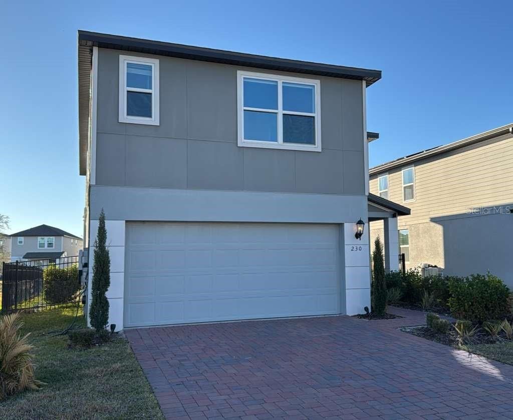 Photo of 230 Whistling Duck Trail, Saint Cloud, FL 34771 (MLS # S5143404)