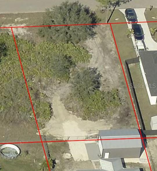 Photo of 2505 69th Street W, Lehigh Acres, FL 33971 (MLS # TB8553845)