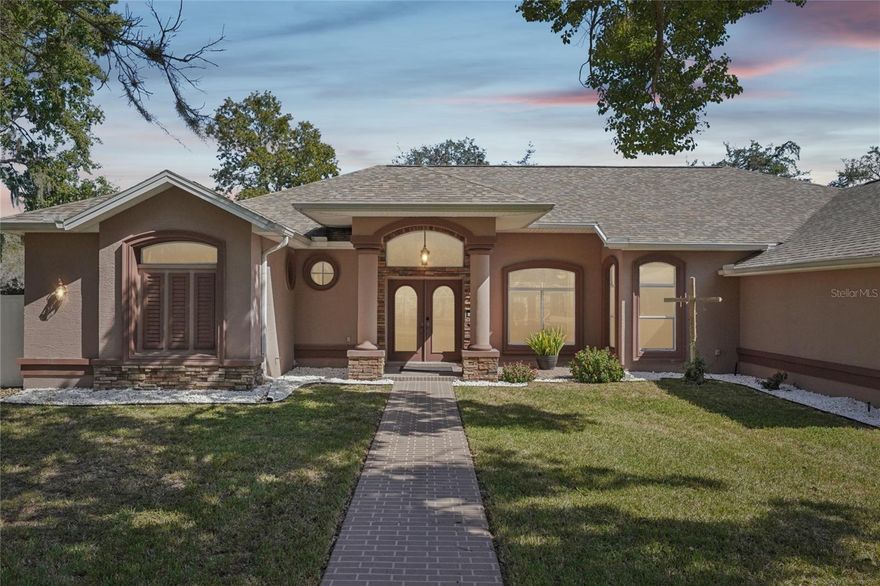 Magnificent Multi-Generational Compound with Resort-Style Amenities & No HOA.
Welcome to a truly unique opportunity for flexible living and long-term investment in the desirable Huntington Woods community of Spring Hill, FL. This magnificent corner property sits on over 1.25 acres across two oversized lots, offering a rare blend of privacy, space, and convenience. Ideal for accommodating aging parents, young adults, or generating extra income, this estate is a must-see.
Main Residence Features:
Spacious Layout: 3 bedrooms, 2 bathrooms, and a 3-car garage.
Modern Touches: Tastefully renovated with stunning porcelain floors throughout and elegant quartz kitchen countertops.
Open Concept: An open floor plan designed for effortless entertaining and large gatherings.
Outdoor Oasis: Step outside to a gorgeous resort-style pool and spa, perfect for year-round enjoyment of the Florida weather.
Detached Guest House:
Fully Equipped: Includes 2 large bedrooms, 1 bathroom, a living room, and a full kitchen.
Private Retreat: Features its own back patio with views of the manicured landscape and a cozy fire pit area.
Property Highlights & Investment Potential:
Flexible Zoning: No restrictions, HOA, or CDD fees. Bring all your toys!
Subdivision Potential: The extra half-acre lot can be legally subdivided and sold separately.
Additional Amenities: Fully fenced backyard with a workshop shed for extra storage or hobbies.
Prime Location: Minutes from a variety of shops, restaurants, parks, hospitals, and major highways for easy commuting.
This property masterfully combines an exceptional lifestyle with significant investment potential. Schedule your private showing today and discover the endless possibilities this compound offers!