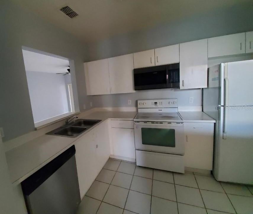 Photo of 13215 Villa Vista Drive #203, Orlando, FL 32824 (MLS # O6441492)