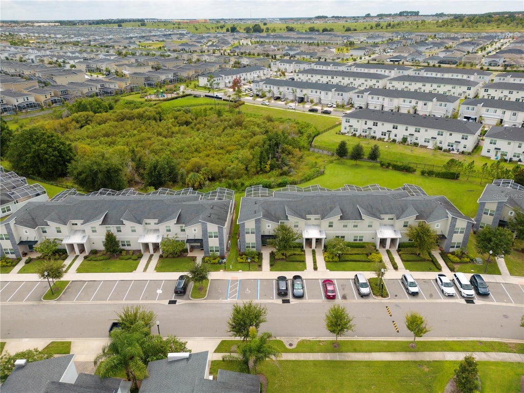 Photo of 302 Ocean Course Avenue, Davenport, FL 33896 (MLS # O6432403)
