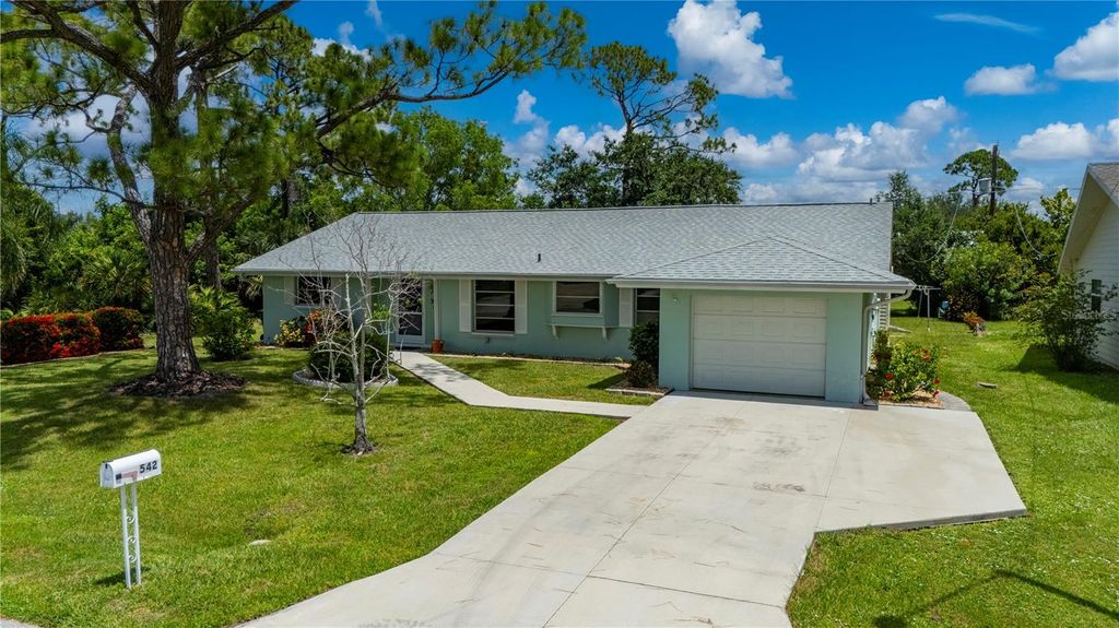 Photo of 542 Lakehurst Avenue NW, Port Charlotte, FL 33952 (MLS # C7512803)