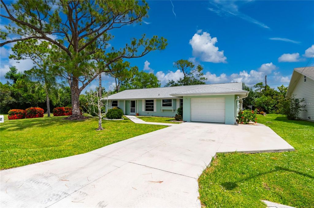 Photo of 542 Lakehurst Avenue NW, Port Charlotte, FL 33952 (MLS # C7512803)