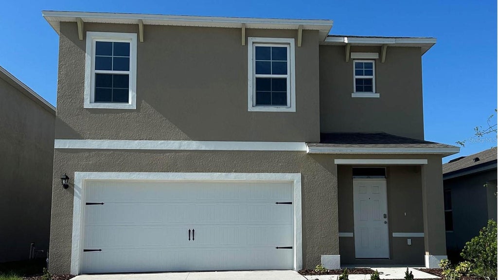 Photo of 6159 Coronari Lane, Winter Haven, FL 33884 (MLS # O6448843)