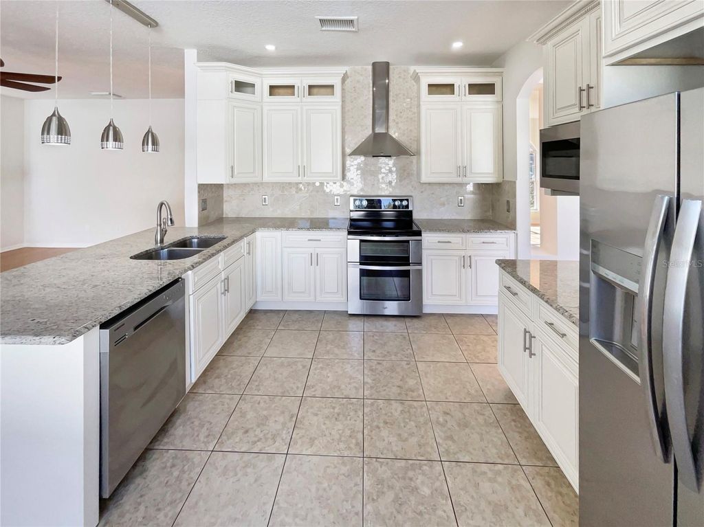 Photo of 3834 Regents Way, Oviedo, FL 32765 (MLS # O6375696)