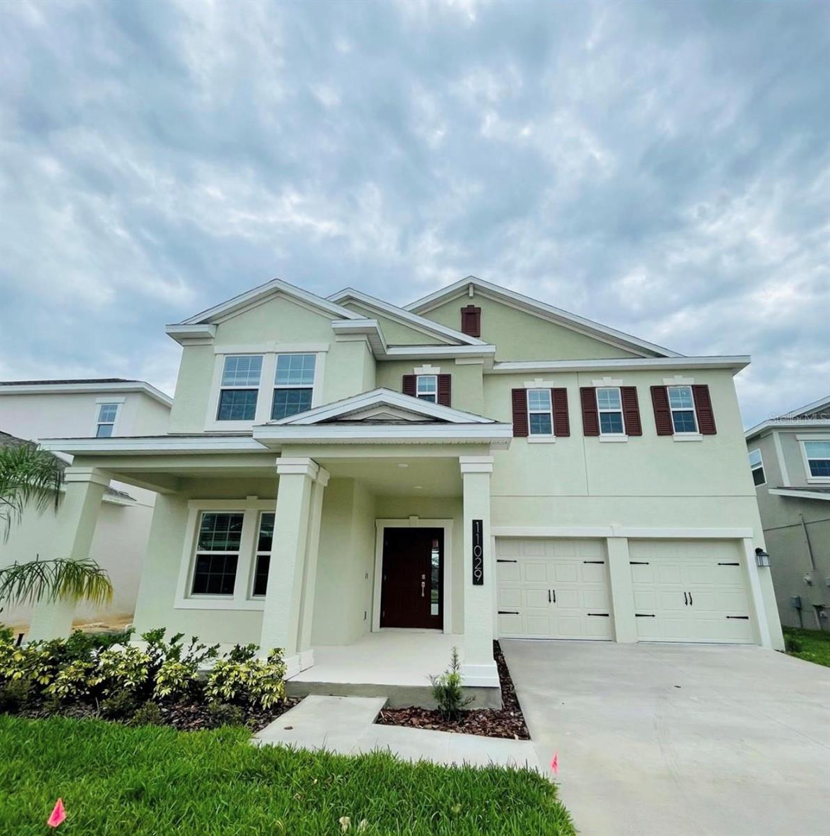 Welcome to this stunning two-story home, built in 2021, nestled in the highly desirable Storey Grove Community in Winter Garden. Just a five-minute drive to A-rated elementary and middle schools, this beautiful residence boasts 4 bedrooms and 2.5 baths, offering 2,683 sq. ft. of living space, along with a convenient two-car garage. As you walk in, you’ll find a spacious flex room on the left, perfect for an office or study. The open floor plan seamlessly connects the family room, dining room, and a modern kitchen featuring a spacious island—ideal for entertaining. The first floor also includes a convenient powder room. The covered patio opens up to a generous backyard, perfect for outdoor gatherings. Upstairs, you’ll discover all four bedrooms, complemented by a versatile loft area. The luxurious primary suite includes a private bath with a large walk-in shower and a roomy walk-in closet. The second-floor laundry room offers added convenience for daily living. Community amenities include a clubhouse with a fitness center, a resort-style swimming pool, a hedge maze, and a dog park, all designed for your enjoyment. The HOA fee is only $192/month and it includes lawn care. With easy access to SR-429, US-192, and SR-545, you’re just minutes from Walt Disney World and the Orange County National Golf Center. Plus, a brand-new Walmart and Publix shopping center are only five to ten minutes away. Don’t miss the opportunity to make this incredible house your home!