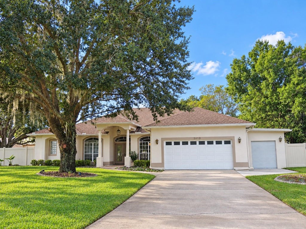Photo of 2413 Eagle Trace Drive, Kissimmee, FL 34746 (MLS # O6446477)