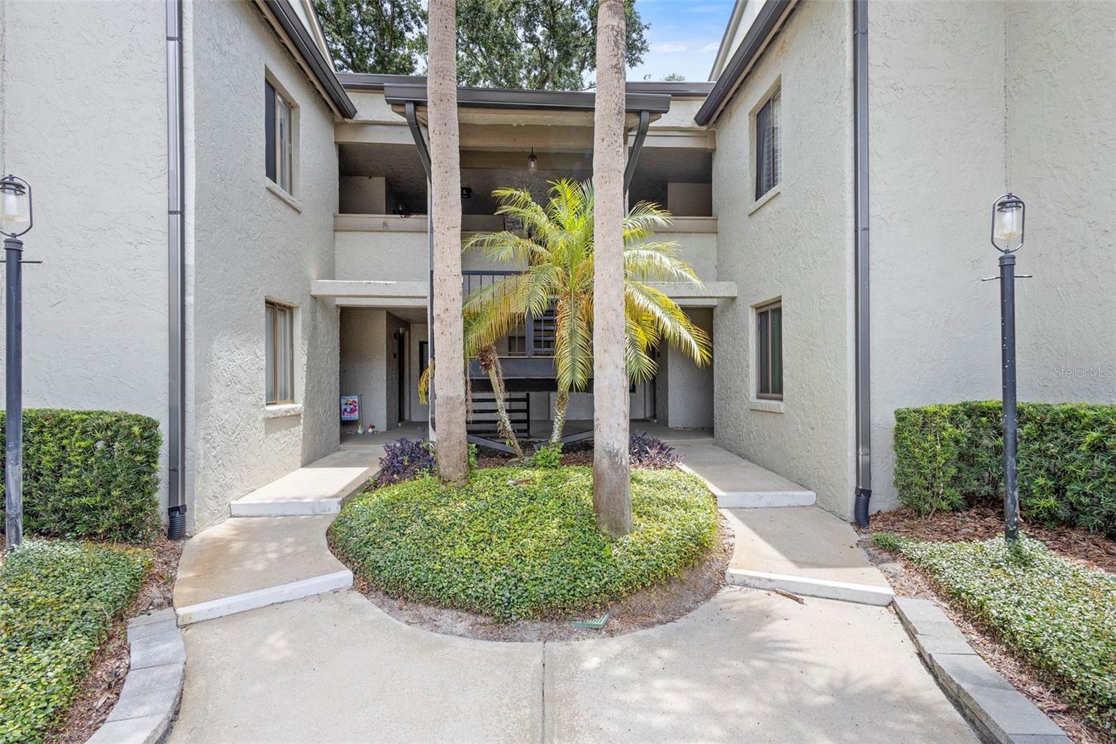 Welcome to this gorgeous condo in Maitland! The high ceilings let the beautiful light in, which make the space feel even bigger! Get cozy in front of the wood- burning fireplace and enjoy cozy evenings. Decorating this home will be super easy with the open layout. Make this home yours and add your special touch. The spacious 2 bedrooms and 2 baths have plenty of closet space. The primary bedroom has a private balcony and absolutely adorable bathroom. Entertain in the separate dining room and cook in your updated kitchen. The community has a pool to relax in and covered parking. There is also a deck to look out over the water. This place is a MUST see!!