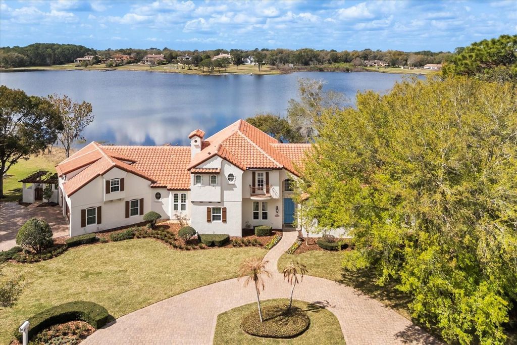 Photo of 27 Stone Gate N, Longwood, FL 32779 (MLS # O6389073)