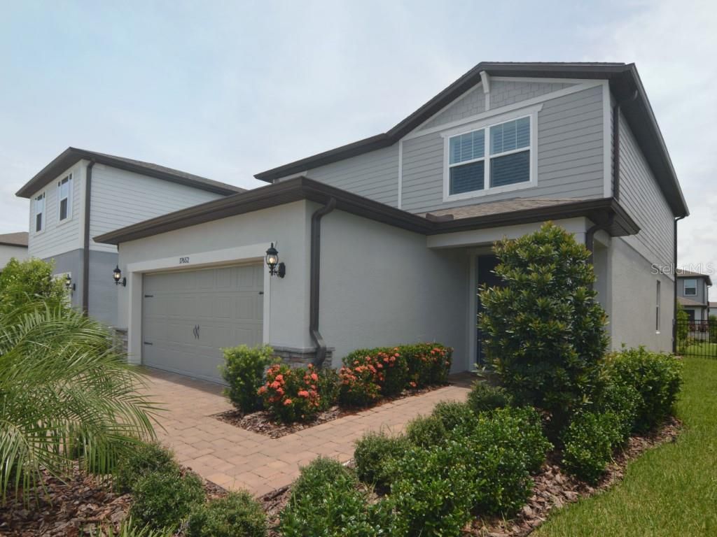 Photo of 17652 Ramble On Way, Land O Lakes, FL 34638 (MLS # TB8404621)