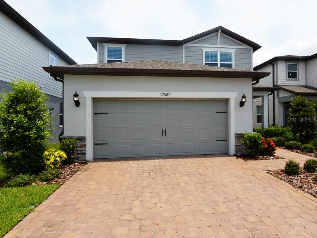 Photo of 17652 Ramble On Way, Land O Lakes, FL 34638 (MLS # TB8404621)