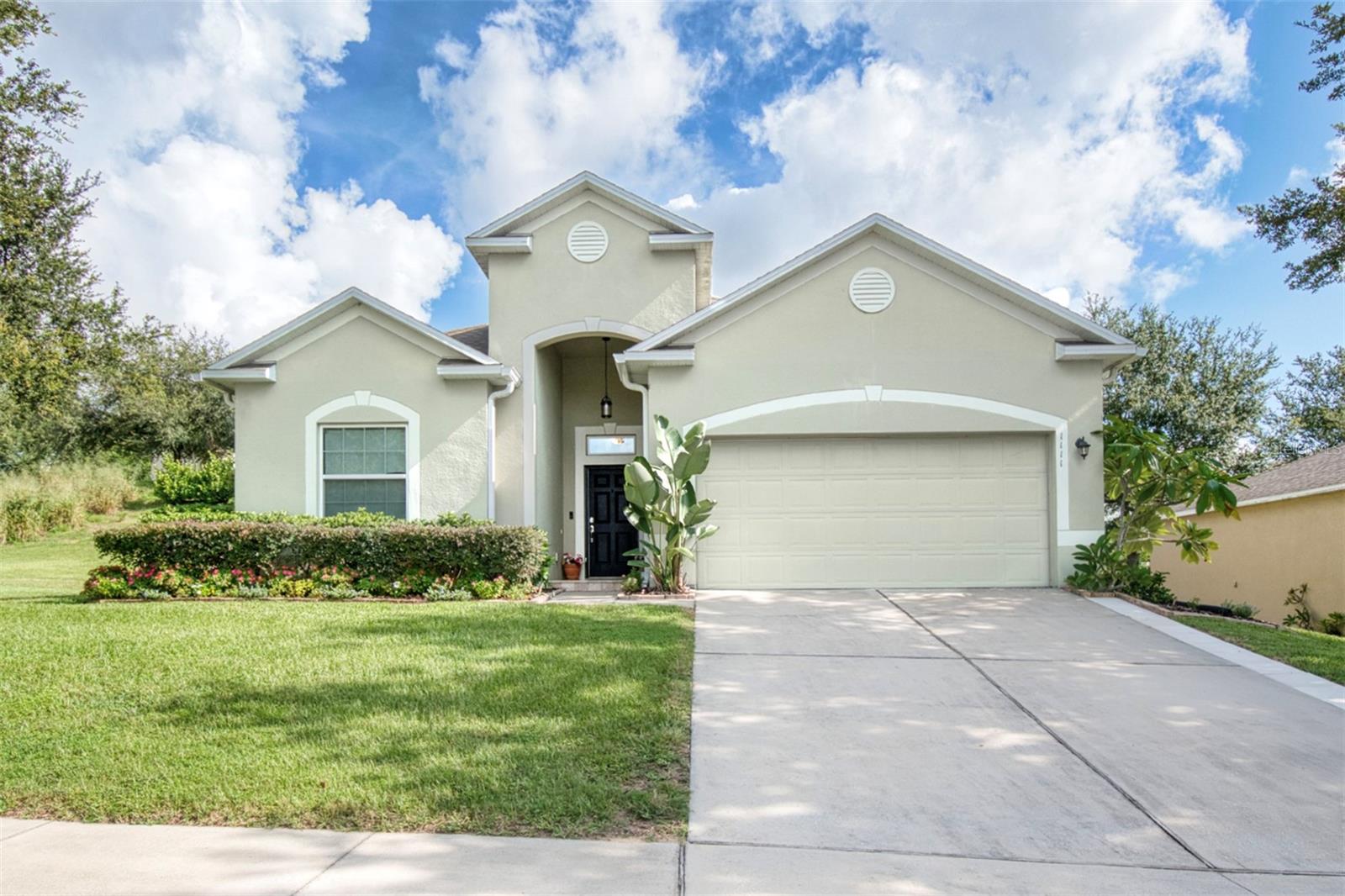 On a quiet cul-de-sac in a neighborhood truly close to everything, this inviting 3/2 bath home PLUS a Den home in Minneola, is designed for easy living and everyday fun. The backyard offers an abundance of fresh fruit with fruit-bearing avocado and mango trees for your enjoyment. It is also a place for play and relaxation with a screened-in pool featuring gentle water features on a beautiful stone wall, a built-in bench, a gorgeous travertine deck, and even a putting green for outdoor fun. There's also a spacious side yard, perfect for little ones, pets, or outdoor games.
Inside, the stylish open kitchen offers modern appliances, granite countertops, a large island, and plenty of storage with a pantry and beautiful wood cabinets. Tile floors throughout the main areas are perfect for busy family life, while a subway back splash and ship lap accents add a cozy, updated feel.
The primary suite is a place for rest at the end of the day, with a tray ceiling, dual vanity, a soaking tub, separate shower, and a private water closet.
You’ll be just around the corner from Grassy Lake Elementary, Lake Minneola High School, and the Minneola Athletic Complex, with quick access to shopping, schools, and the Hancock Road Turnpike exit—making school drop-offs, commutes, and weekend outings simple.
Make this great home yours! Call for your showing.