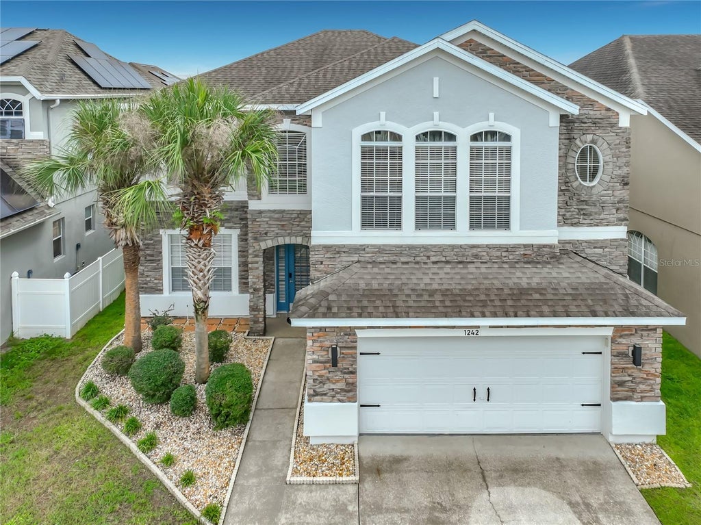 Photo of 1242 Darnaby Way, Orlando, FL 32824 (MLS # O6438476)