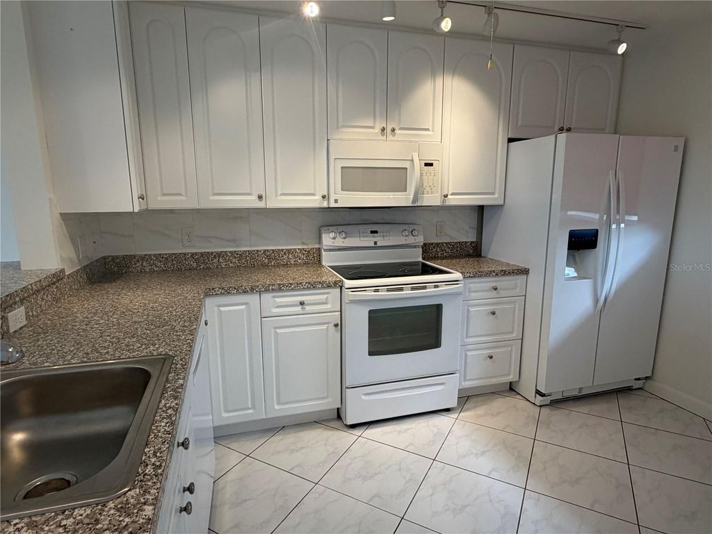 Photo of 3840 Ironwood Lane #506H, Bradenton, FL 34209 (MLS # A4684394)