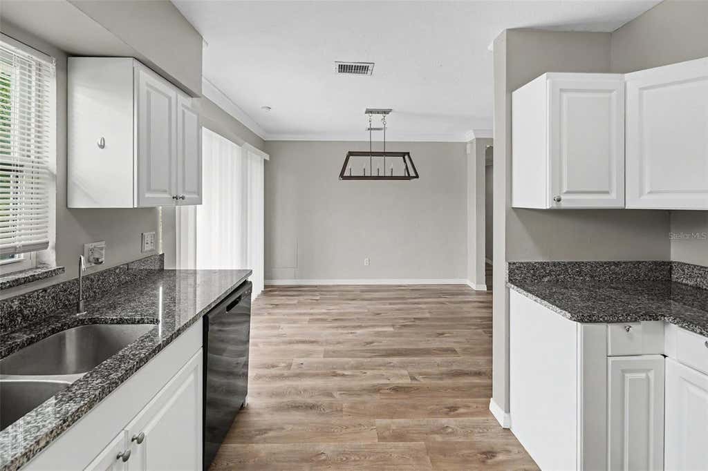 Photo of 4101 Bluefish Drive SE, St Petersburg, FL 33705 (MLS # O6424902)
