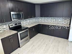 Photo of 759 Clifton Hills Street, Orlando, FL 32828 (MLS # O6426885)