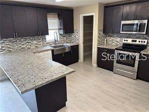 Photo of 759 Clifton Hills Street, Orlando, FL 32828 (MLS # O6426885)
