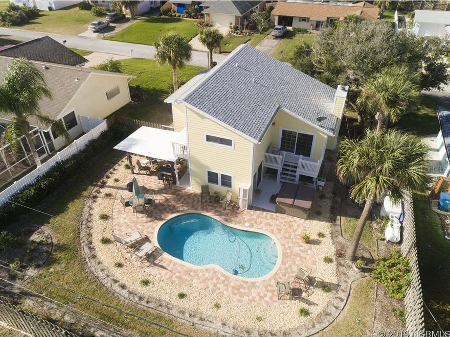 Presented is a most unique and perfect example of a beach house, complete with private saltwater pool and 1-car garage for all your toys. Youâll love the lines of this multi-level architectural masterpiece. The design is an open-air concept with bedroom suites, loft, wood-burning fireplace and wonderful social spaces for entertaining or just simply relaxing. The home sits high above the street and is just a short 2-block walk to the NO-DRIVE BEACH or utilize the parking lot adjacent to the beach ramp. Also enjoy being just one block to the HILES BOAT RAMP, perfect for launching small boats, kayaks and SUPs. This home recently underwent a MAJOR RENOVATION including new impact glass windows and sliders (except fixed glass), Hardi board siding, new architectural shingle roof, new soffits, new gutters and downspouts, chimney cap, new insulated front porch roof, a complete kitchen renovation with island counter and slate stainless steel appliances, bathroom renovations, plank tile flooring, stair carpeting, trim, barn doors, new washer & dryer, new ductwork, insulation, master walk-in closet, new painting inside and out, new wood decking, new heated saltwater pool, paver deck, fenced yard, tiki hut and landscaping. Plenty of room on the expanded driveway to accommodate guests. Septic recently pumped in Fall of 2018. Tiki bar with built-in table and chairs conveys.  Hot tub negotiable. ALL INFORMATION IS ASSUMED ACCURATE BUT NOT GUARANTEED. ALL MEASUREMENTS ARE APPROXIMATE. BUYERS AND THEIR AGENTS TO VERIFY ALL INFORMATION DEEMED IMPORTANT TO THEM. ;Water: City