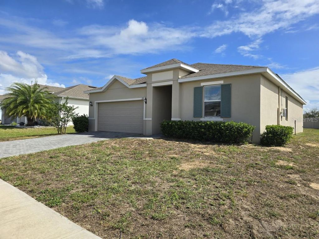 Photo of 231 Tarpon Bay Boulevard, Haines City, FL 33844 (MLS # A4667599)