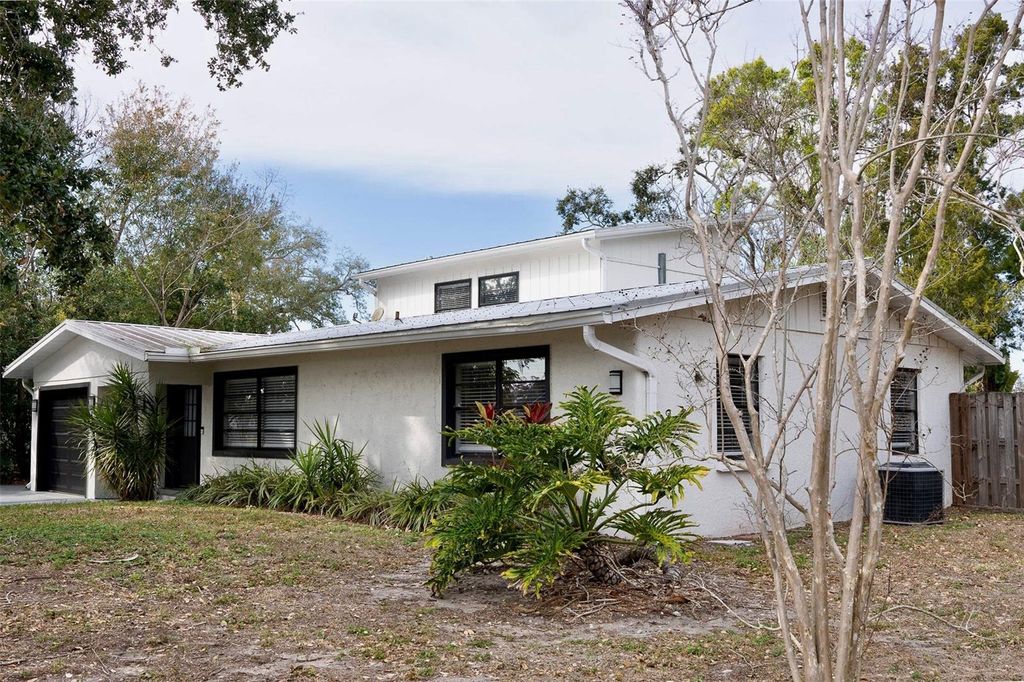 Photo of 3857 Woodrow Ridge Street, Sarasota, FL 34233 (MLS # A4683318)