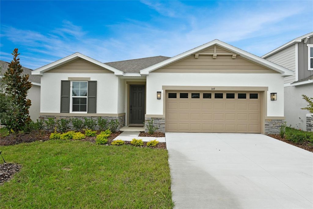 Photo of 145 Waterstone Loop, Tavares, FL 32778 (MLS # S5137110)