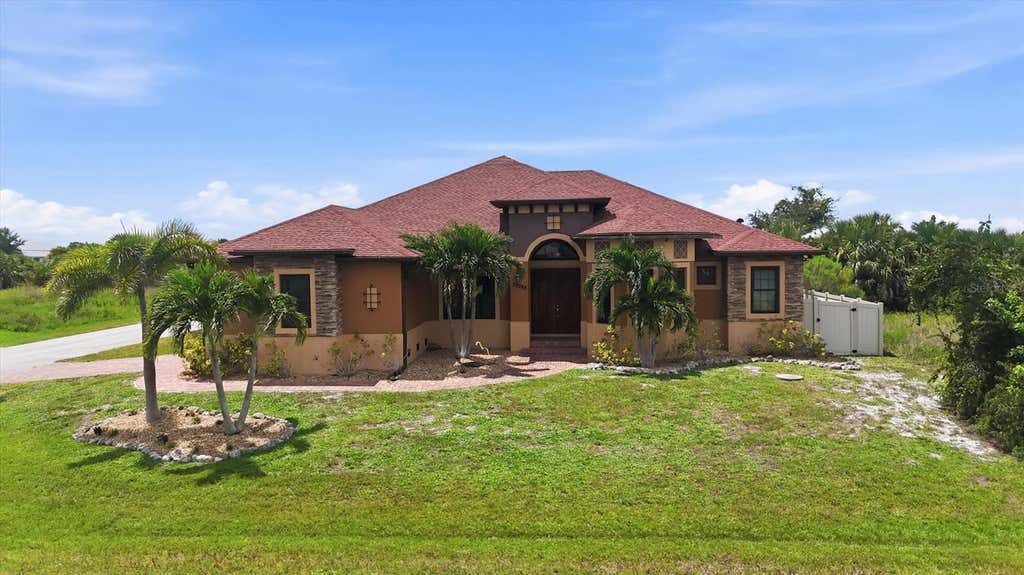 Photo of 10393 Harlingen St, Port Charlotte, FL 33981 (MLS # D6148498)