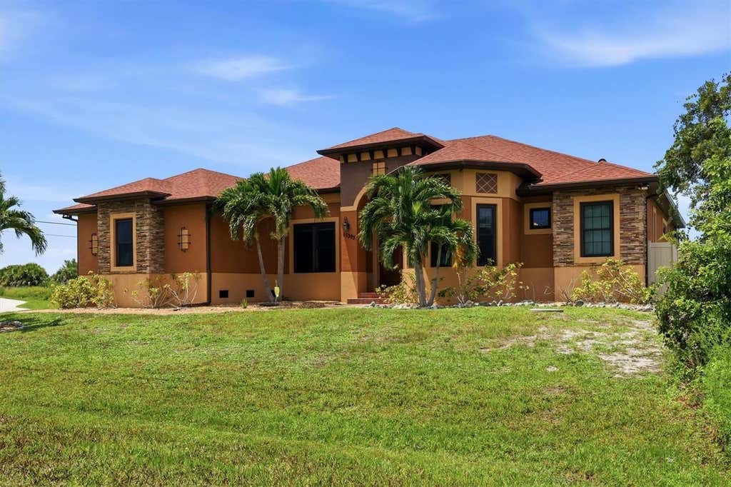 Photo of 10393 Harlingen St, Port Charlotte, FL 33981 (MLS # D6148498)