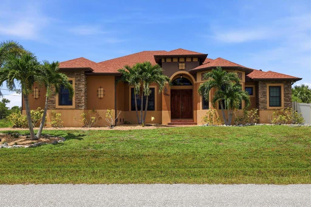 Photo of 10393 Harlingen St, Port Charlotte, FL 33981 (MLS # D6148498)